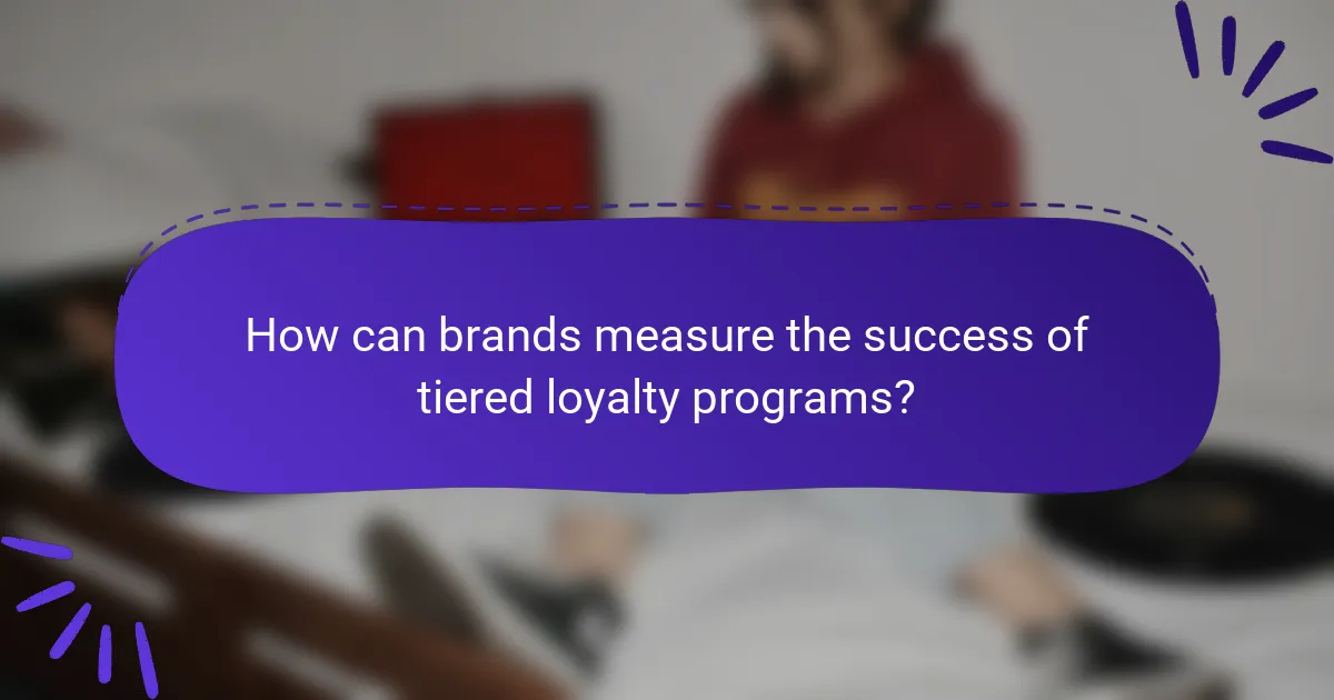 How can brands measure the success of tiered loyalty programs?
