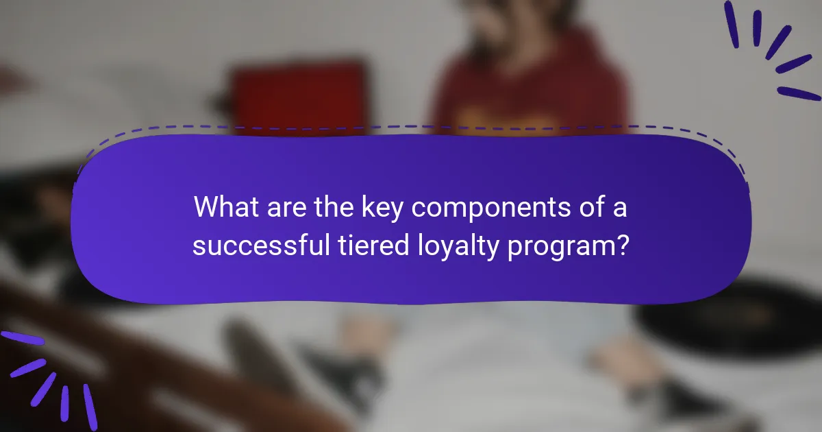 What are the key components of a successful tiered loyalty program?